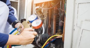 HVAC service technician air conditioner maintenance.