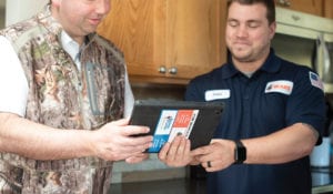 Customer and HVAC service technician.