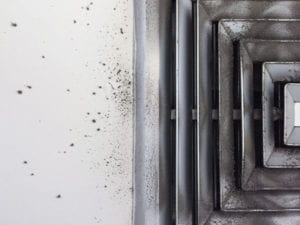 Close-up of dirty air vent.